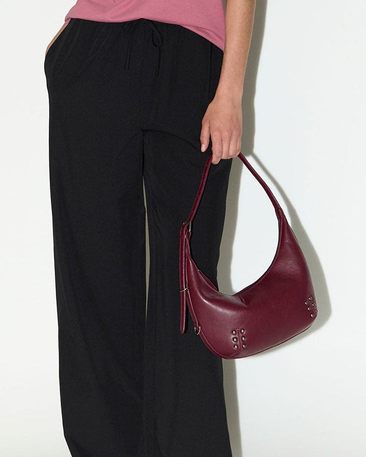 Bolso hombro tachas