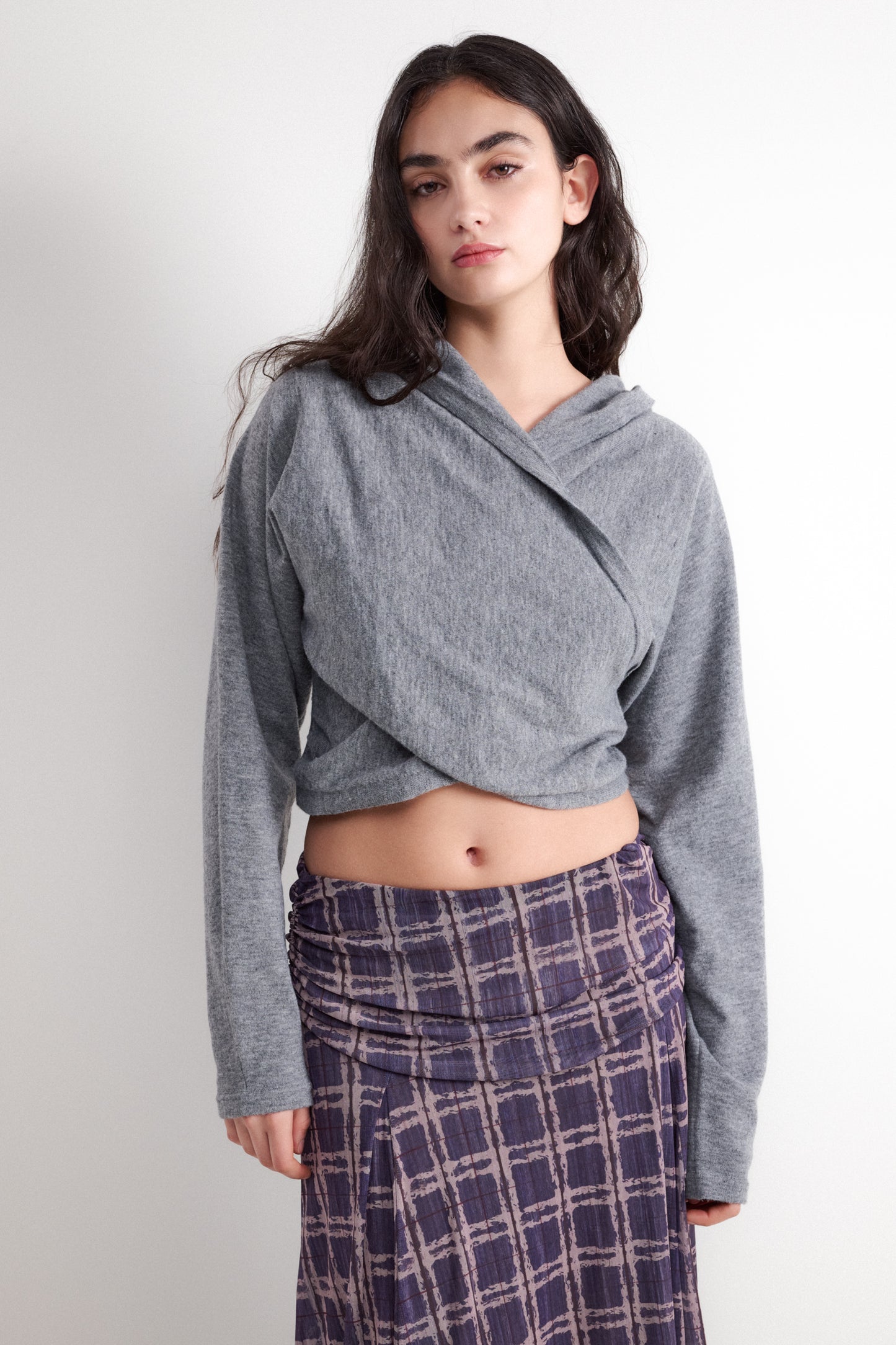 Crossover style hooded sweater