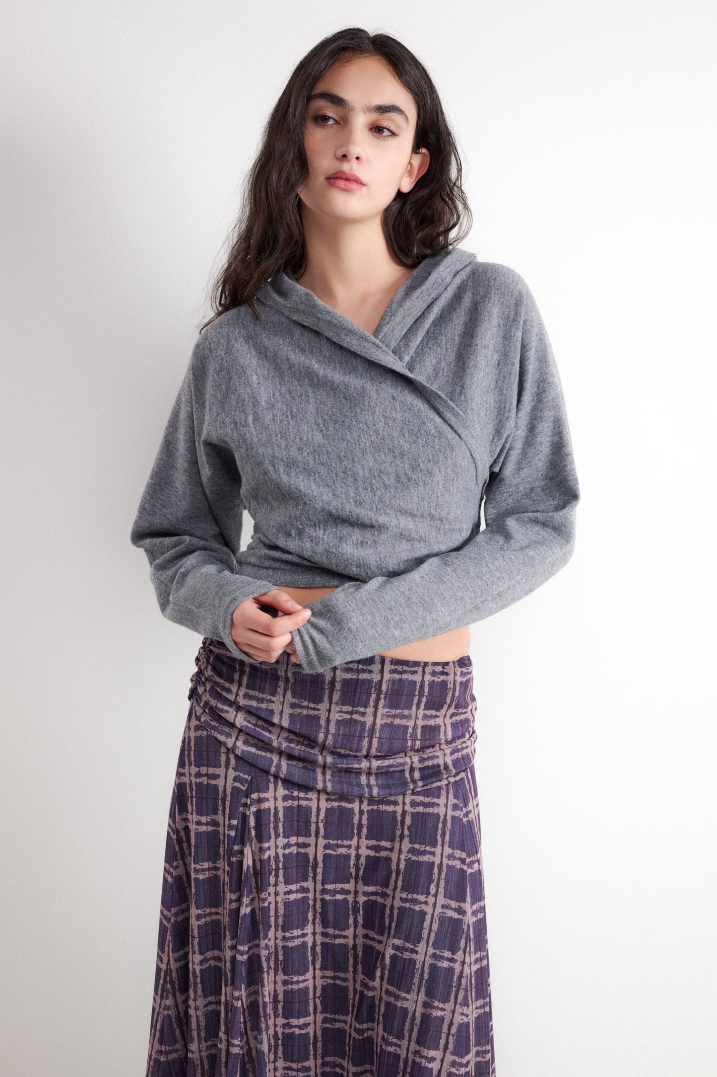 Crossover style hooded sweater