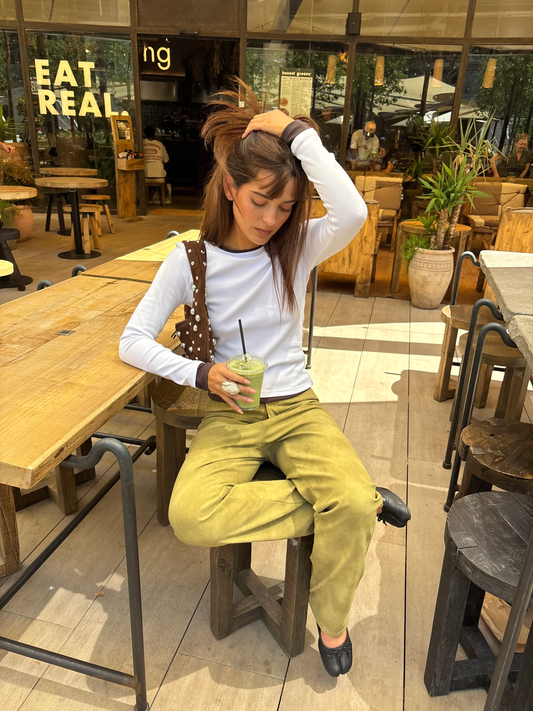 Suede effect trousers with bow detail