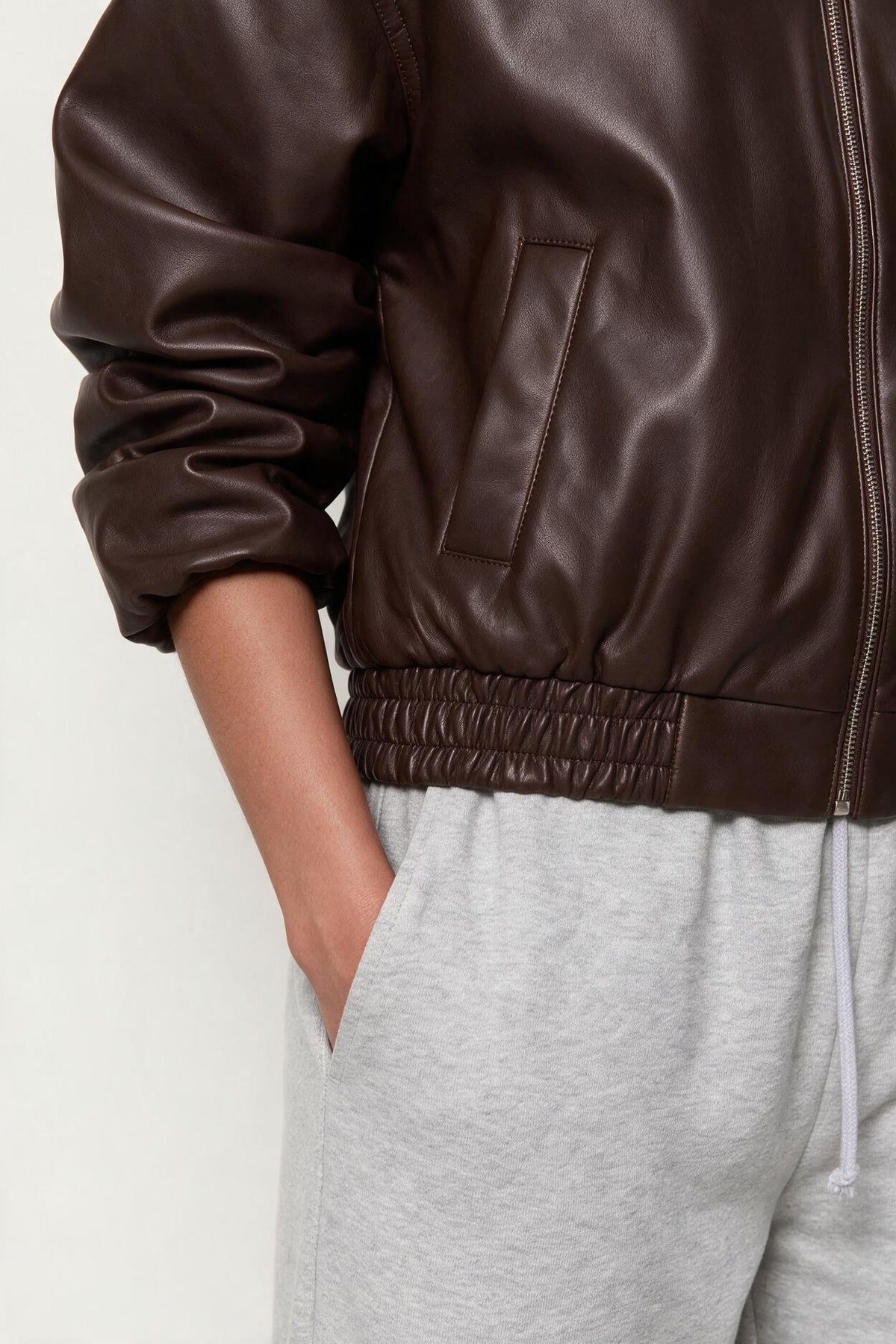 Faux leather jacket with elasticated hem
