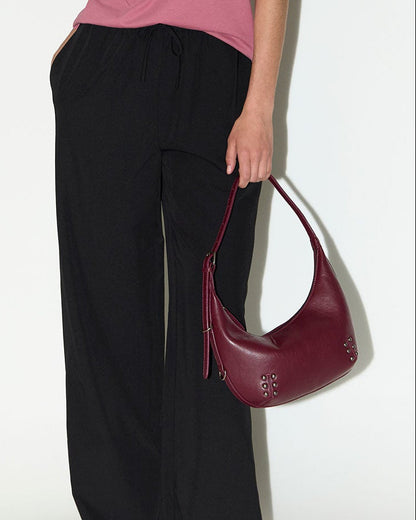 Bolso hombro tachas