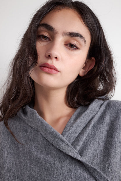 Crossover style hooded sweater