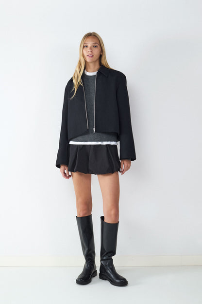 Chaqueta suave con cremallera