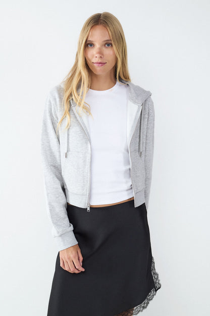 Sudadera cremalllera capucha