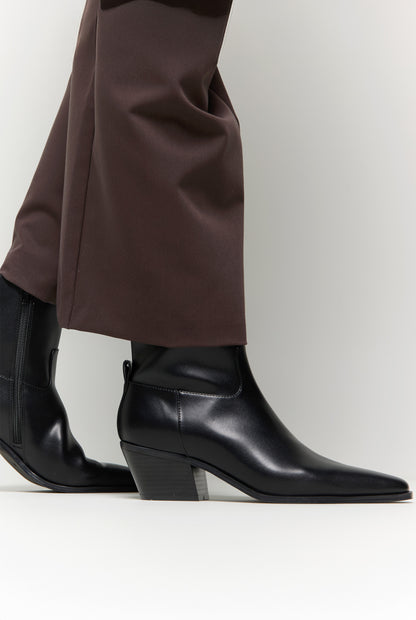 Country heeled ankle boot
