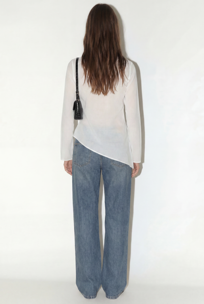 BLUSA BAJO ASIMÉTRICO