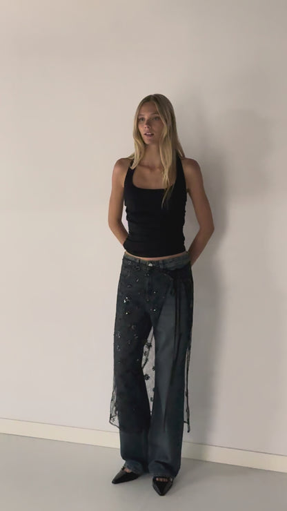 FALDA MIDI TRANSPARENTE LENTEJUELAS